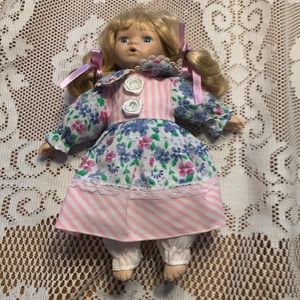 Three porcelain. Dolls